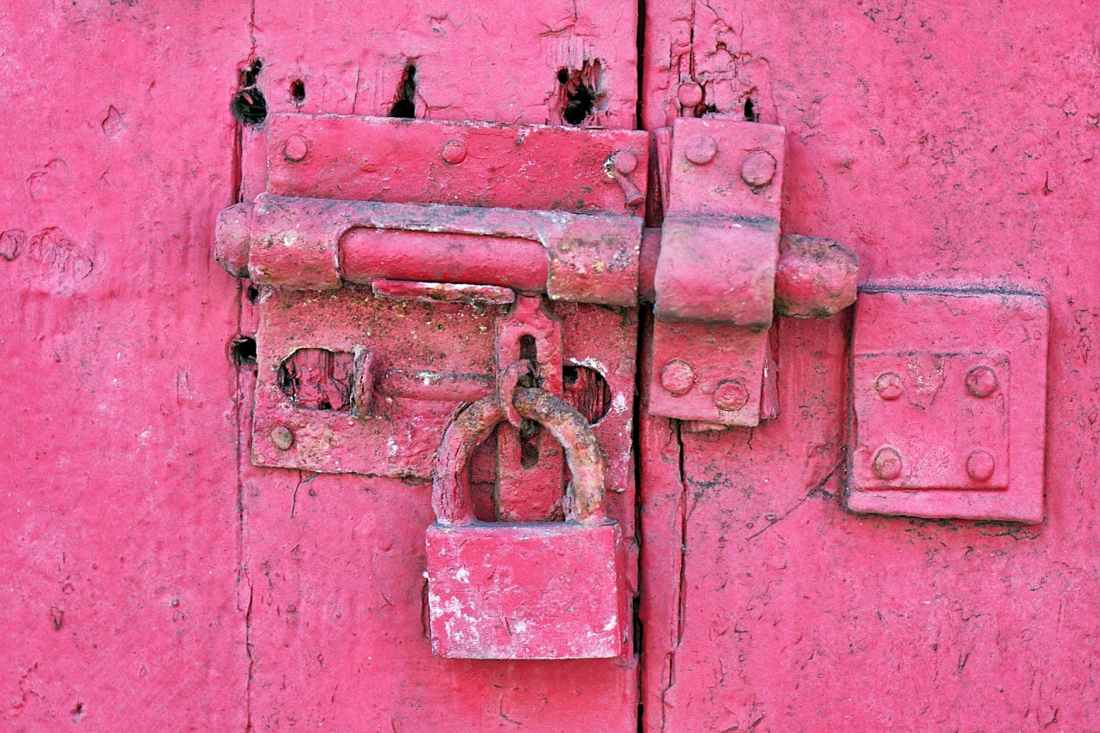 red metal padlock
