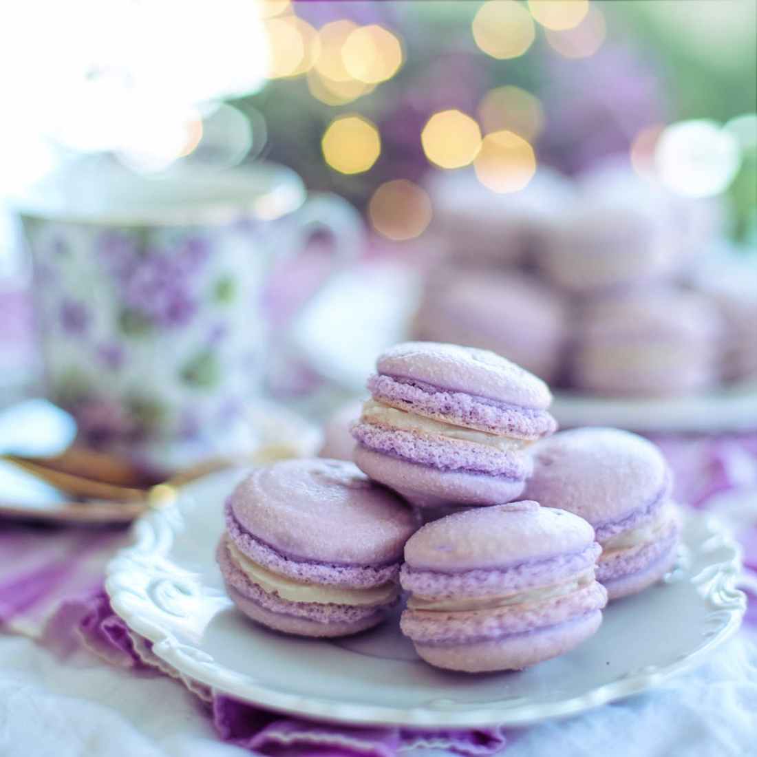 close up photo of macarons on plate